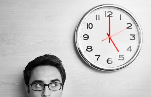 Man thinking about what time it is in other parts of the world